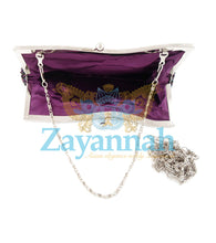 Purple sequin clutch