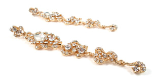 Long length gold earrings