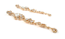Long length gold earrings