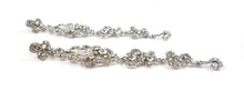 Long length silver earrings